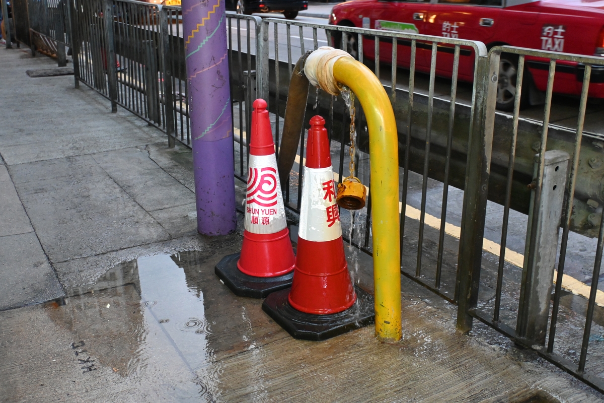 Photo by Vanessa Yeung: Water leak and cones in Sai Ying Pun