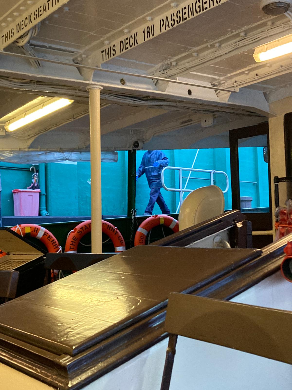 Photo by Vanessa Yeung: A star ferry staff member preparing for disembarkation